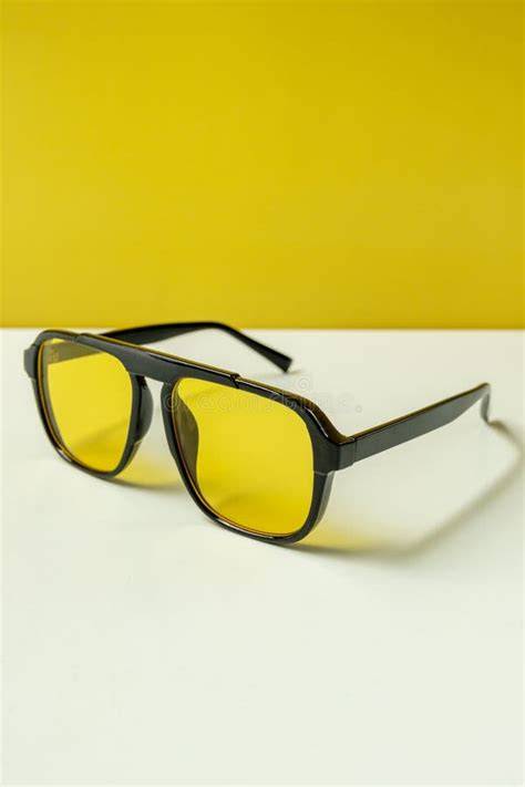 illustration of wooden frames with yellow lenses